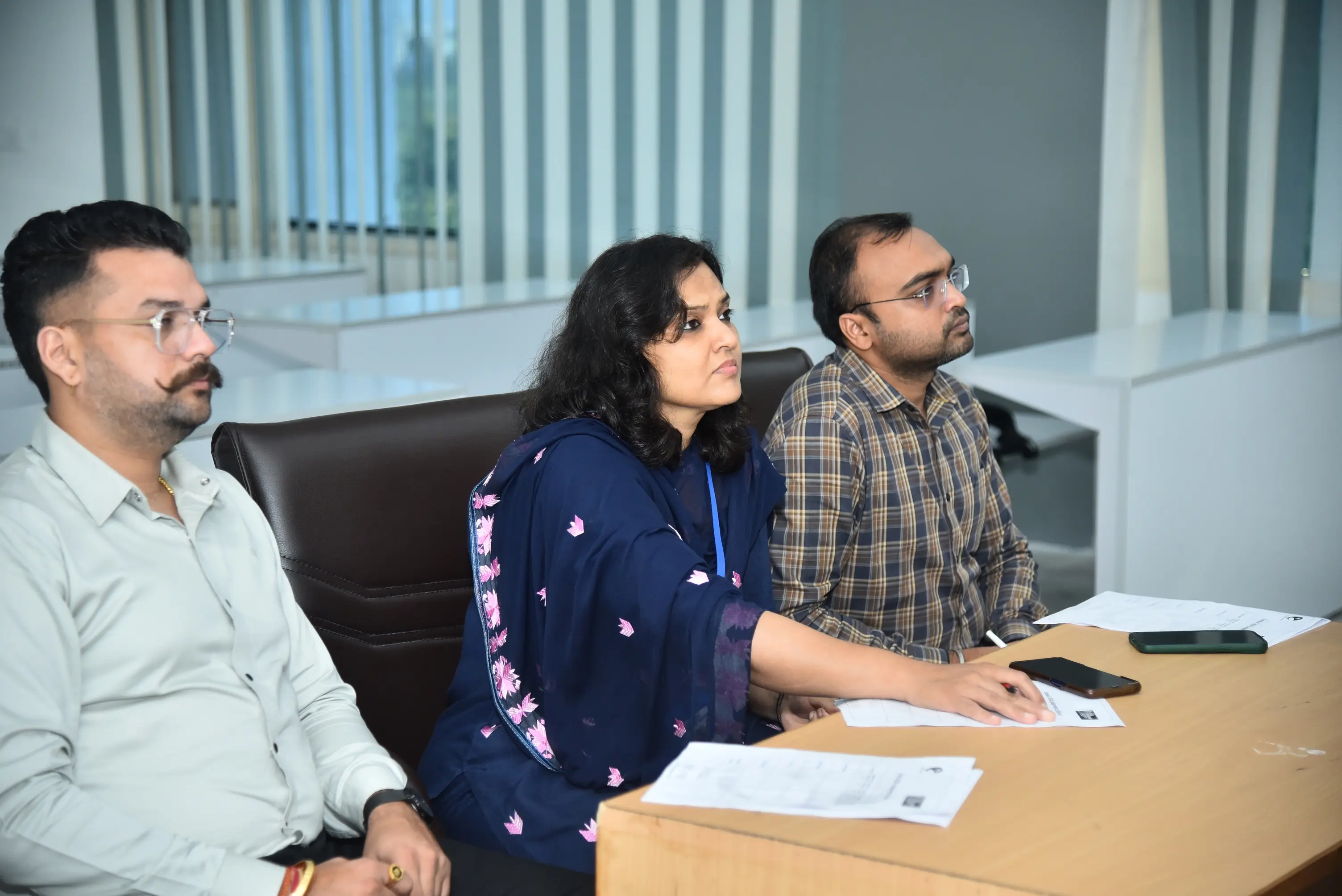 Hackathon participants in discussion